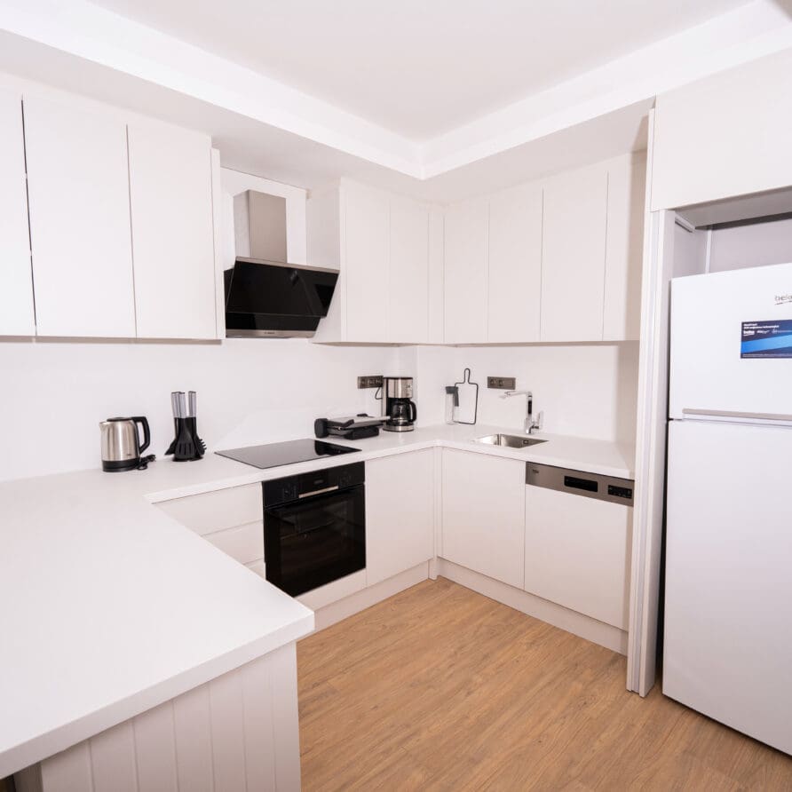 Modern living area two bedroom garden view suite in Lara Breeze Kundu Kanyon