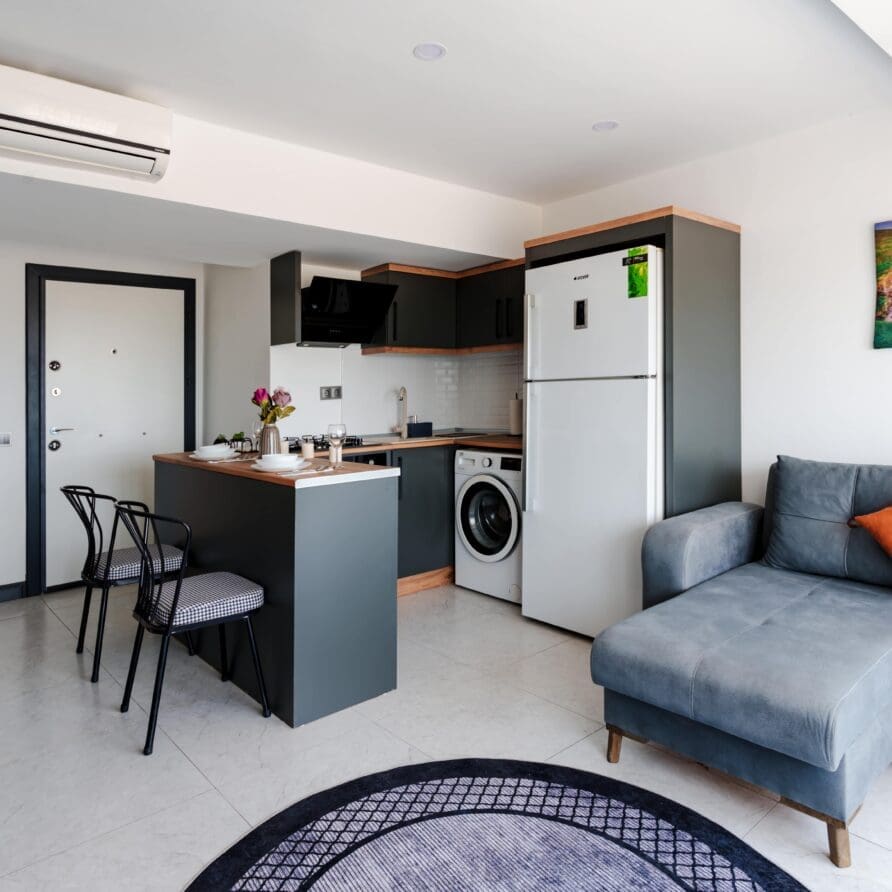 open plan living area in two bedroom queen apartment