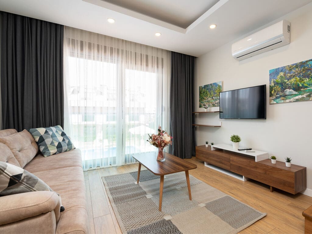 living area with pool view in 45 sqm duplex suite