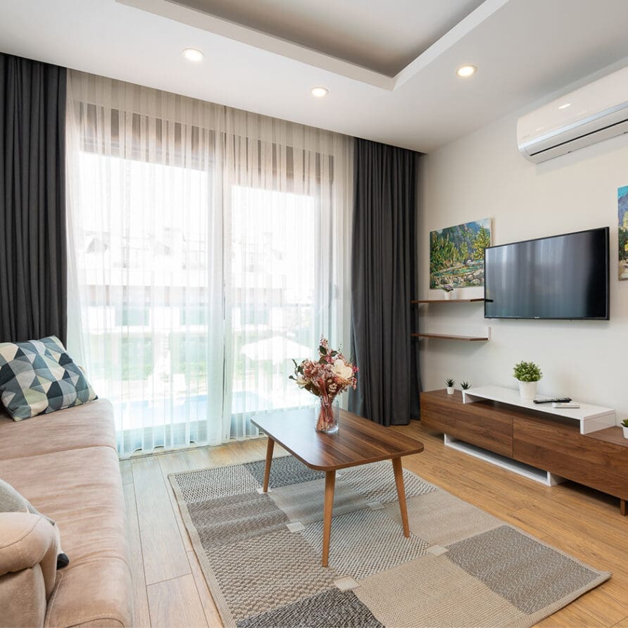 living area with pool view in 45 sqm duplex suite